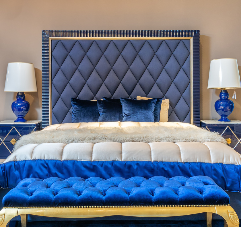 Bed with blue upholstered headband