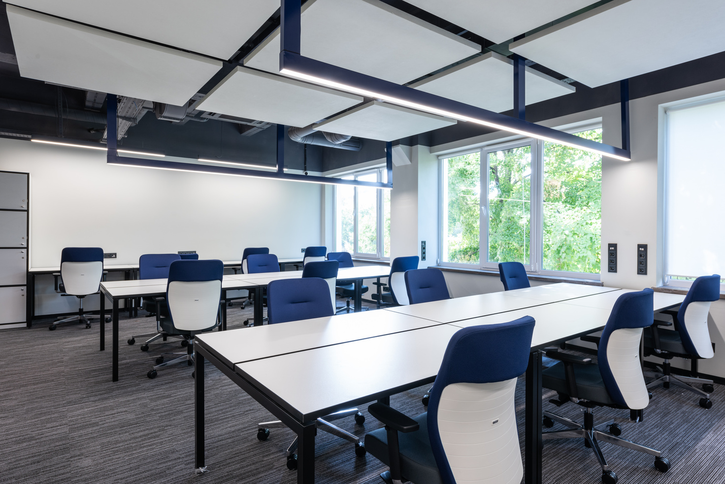 Contemporary office with chairs at desks